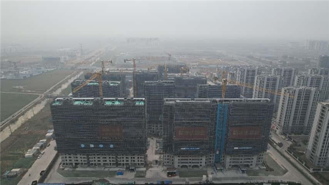南宫28瑞璟·云府项目房地产开辟项目21号楼喜封金顶(图1)
